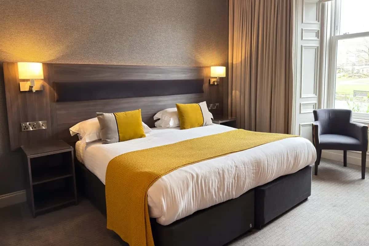 Square View Room with a queen sized bed at The Angus Hotel Blairgowrie