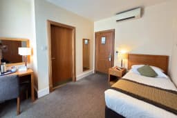 Single Room with a single bed at The Angus Hotel Blairgowrie