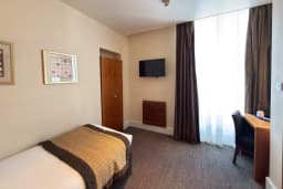 Single Room with a single bed at The Angus Hotel Blairgowrie