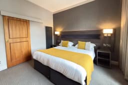 Square View Room with a queen sized bed at The Angus Hotel Blairgowrie