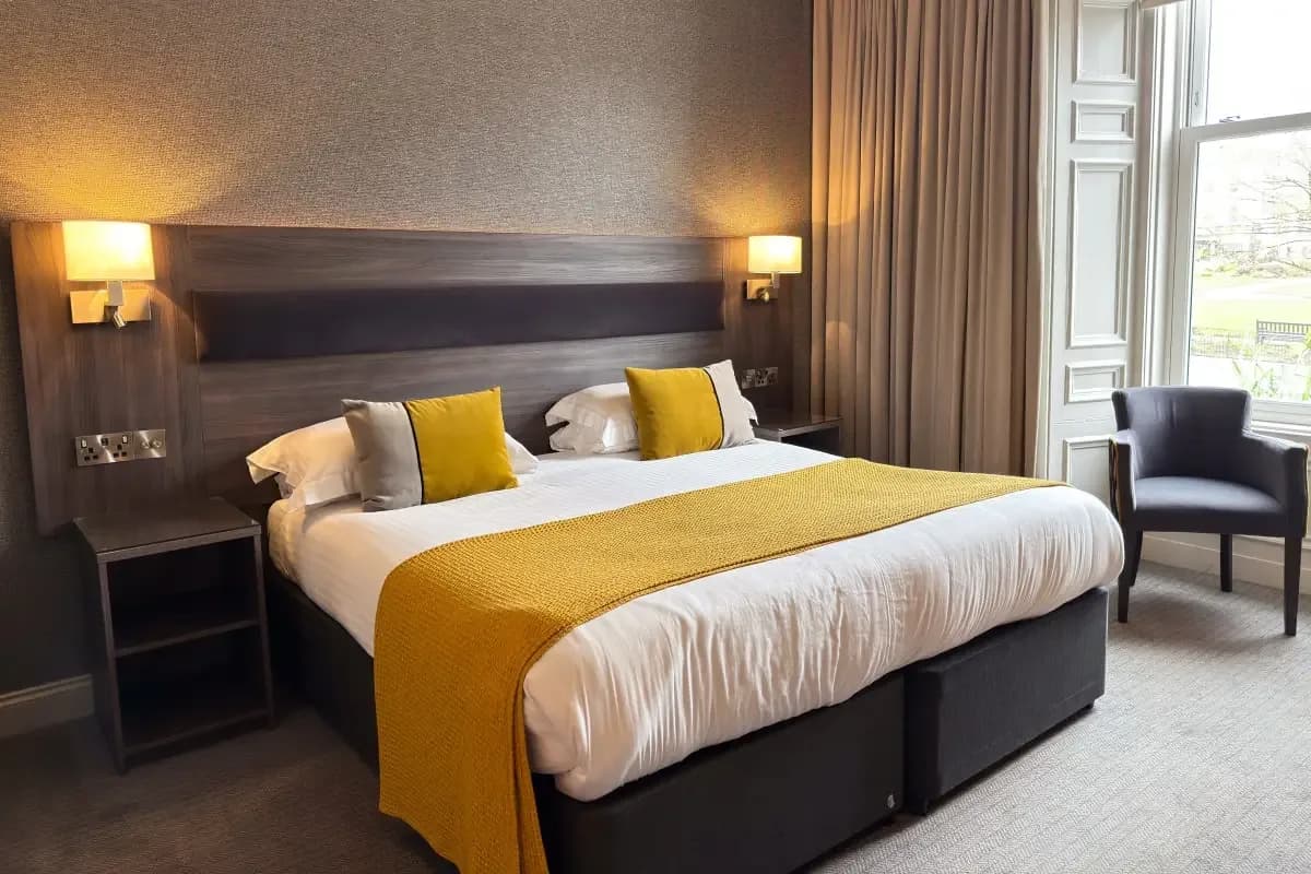 Square View Room with a queen sized bed at The Angus Hotel Blairgowrie