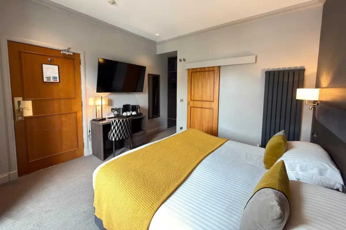 Square View Room with a queen sized bed at The Angus Hotel Blairgowrie