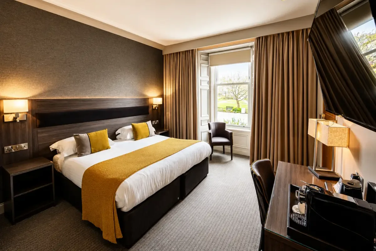 Square View Room with a queen sized bed at The Angus Hotel Blairgowrie